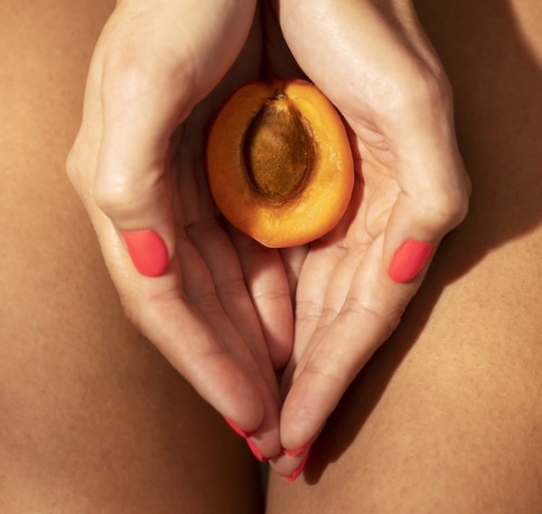 Woman with peach